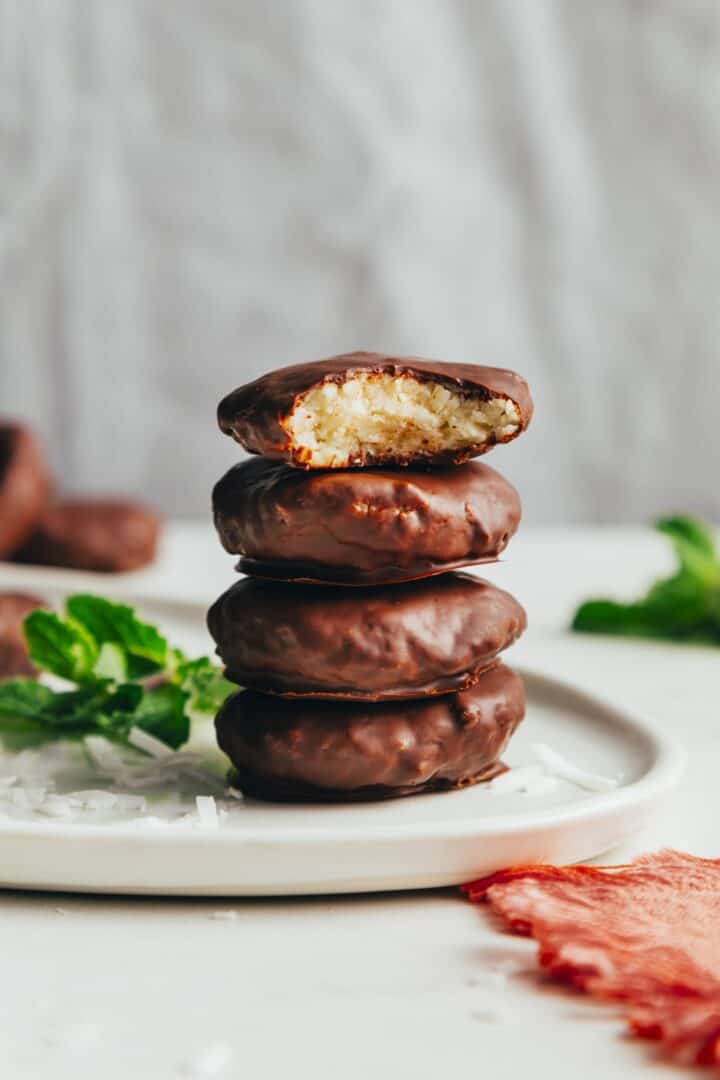 Four peppermint patties stacked on top of each other.