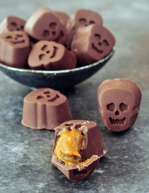 Skull shaped chocolates with a pumpkin filling inside.
