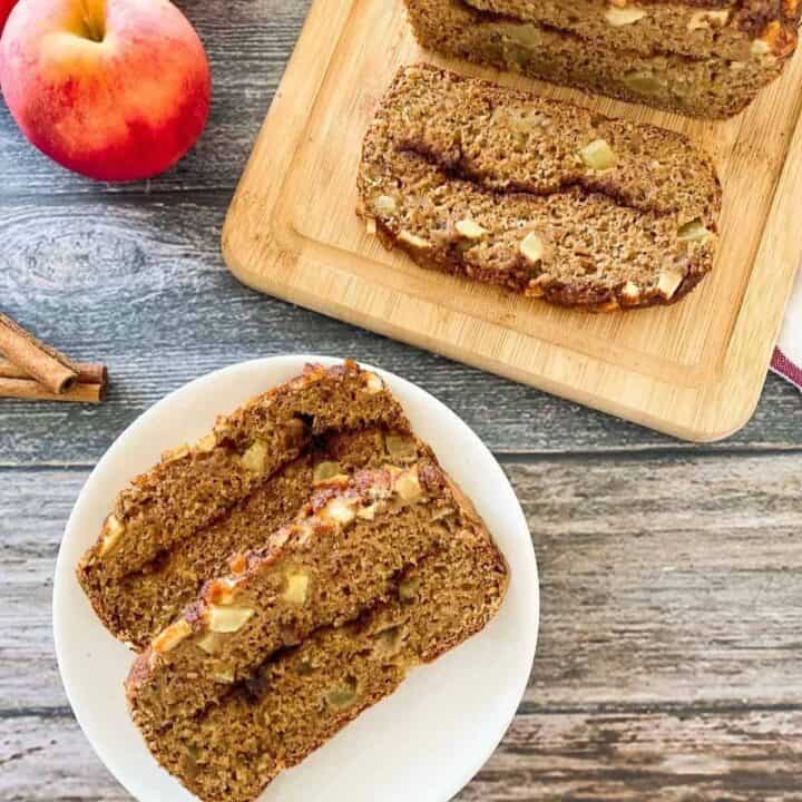 Two slices of apple bread on a plate.