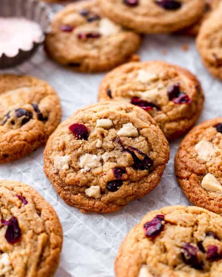 Golden brown cookies with white chocolate and cranberries in.