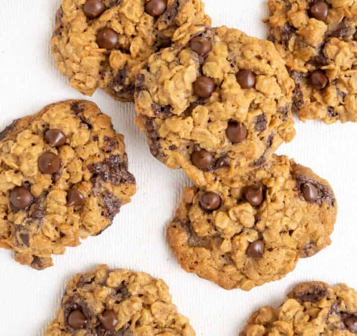 Golden brown oatmeal cookies studded with chocolate chips.
