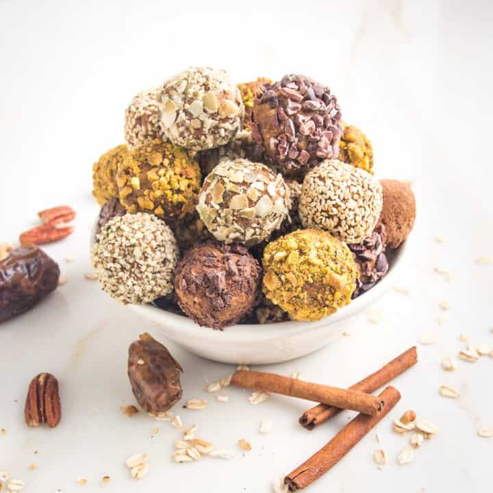 A bowlful of pumpkin balls rolled in a variety of toppings.