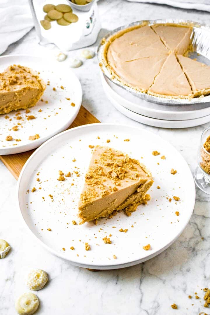 A slice of peanut butter pie on a plate.